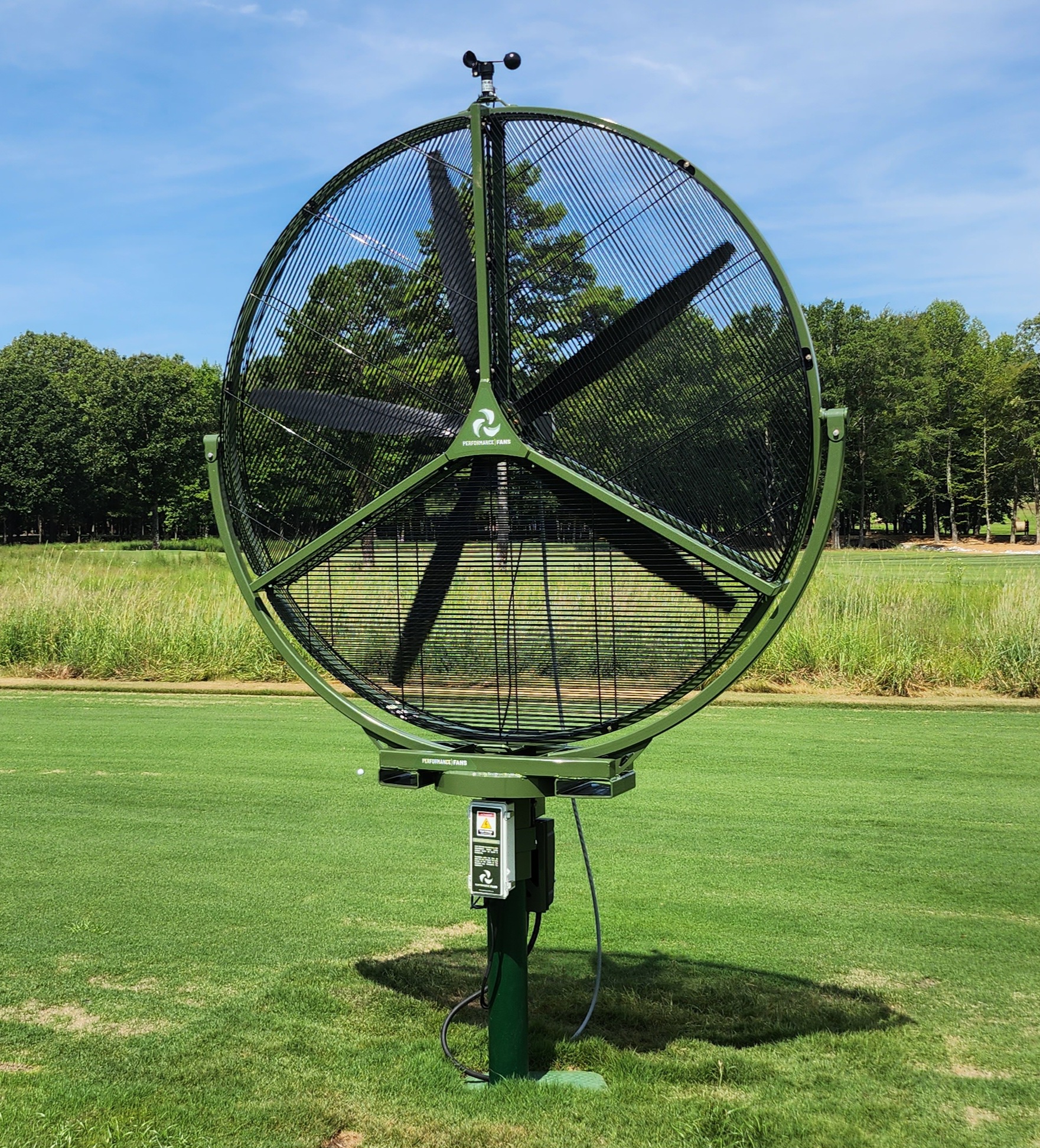 "Performance Fan with carbon fiber blades and open housing for efficient golf course airflow